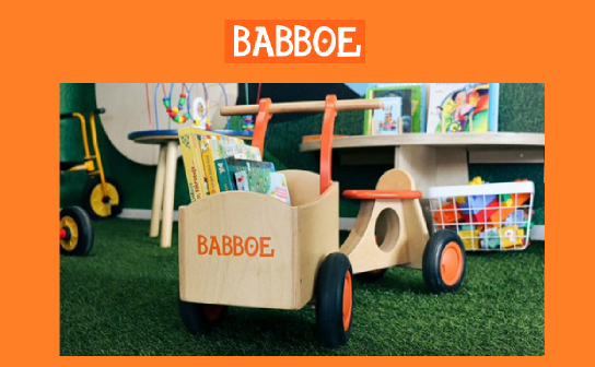 Babboe: verlost wird 3 x ein mit Kinderbüchern gefülltes Lastenrad-Laufrad