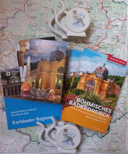 Visit Czechia - zwei Gewinnpakete mit Reiseführer, Trinkbechern, Notizbuch und Kugelschreiber