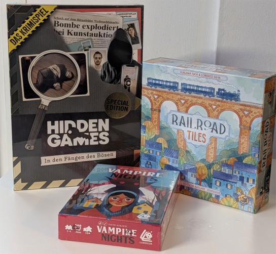 Brettspielpoesie - Das Krimispiel – Special Edition: In den Fängen des Bösen (Hidden Games) Railroad Tiles (HeidelBÄR Games) Vampire Nights (Ludolux)
