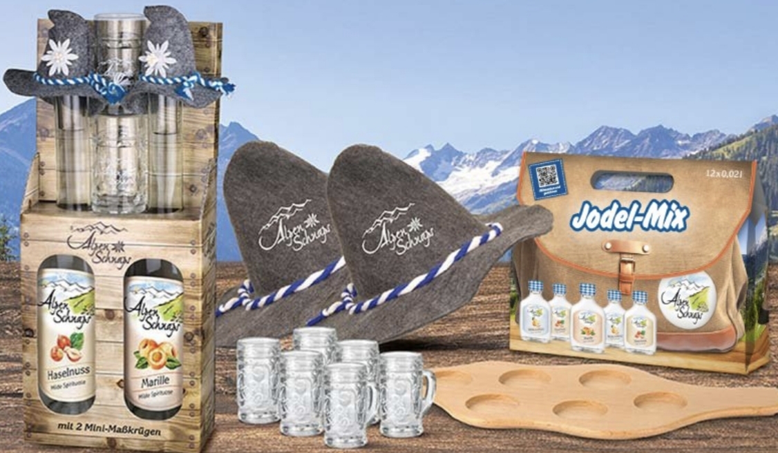 alpenschnaps - 1 von 10 "Hütten-Packerl" inkl. 2 x Filzhut, 1 x Serviertablett, 6 x Mini-Maßkrug (0,4 l), 1 x Alpenschnaps Geschenk-Set (2 x 0,5 l Fl.) und 1 x Jodel-Mix