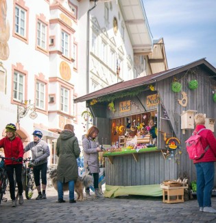 München mit Kind - „Tölzer Wertkarte“ mit einem Einkaufsbudget im Wert von 50 €, einzulösen in vielen teilnehmenden Geschäften der Innenstadt