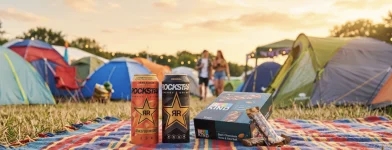 Unicum - 1 von 2 ultimativen Festival-Boxen. Jedes Paket enthält eine ganze Box BE-KIND Protein-Riegel sowie 2 Dosen Rockstar Energy Drink