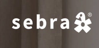 Sebra Interior - eine Sebra Wickelauflage, einen Korb für Wickelzubehör und einen 3-Pocket Hängeorganizer